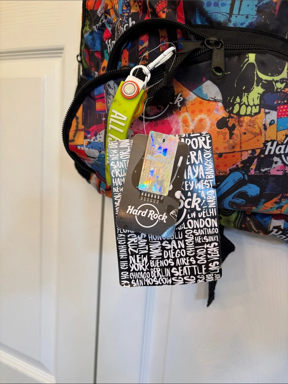 Hard Rock Cafe Multicolor Graffiti Skull Backpack with Neon Green Tag